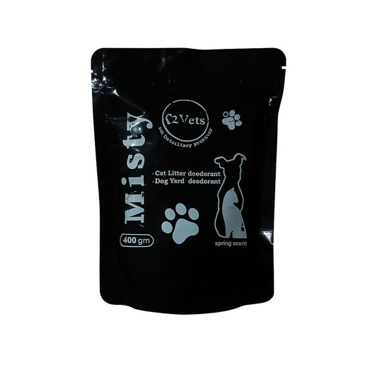 Black packaging of Misty cat litter deodorant with branding on a white background