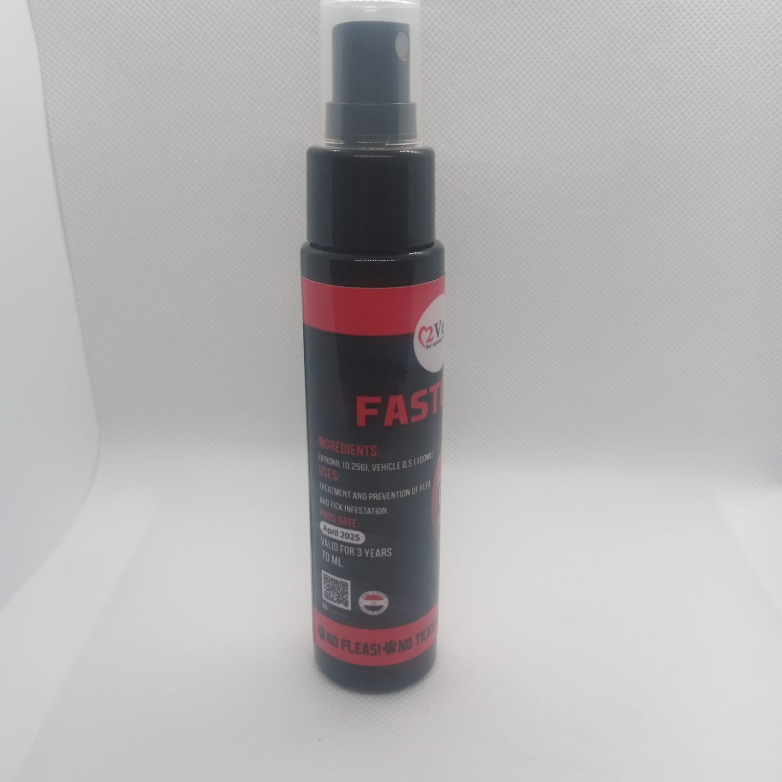 Black and red spray bottle labeled 'FAST' on a white background