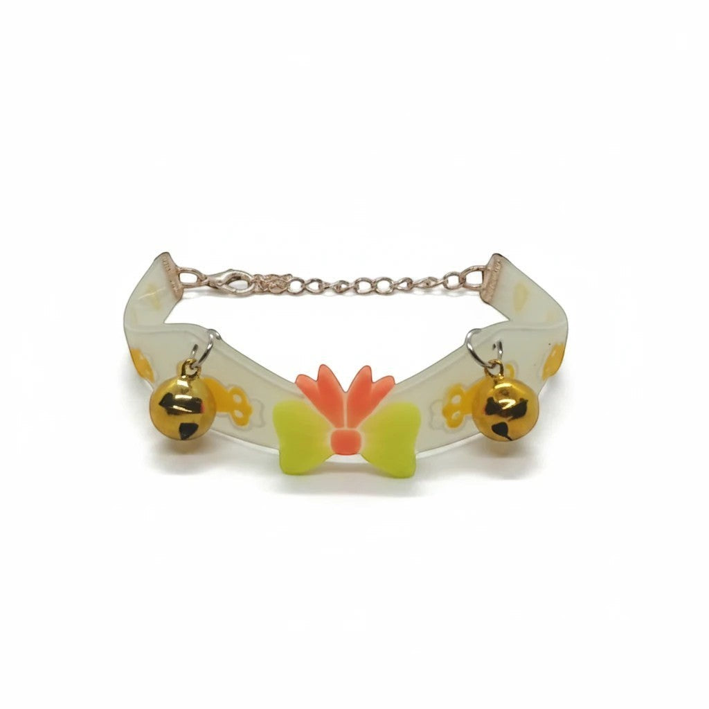 PetFriend fluorescent pet collar featuring a gilded chain, double bells, and a decorative yellow and orange bow.