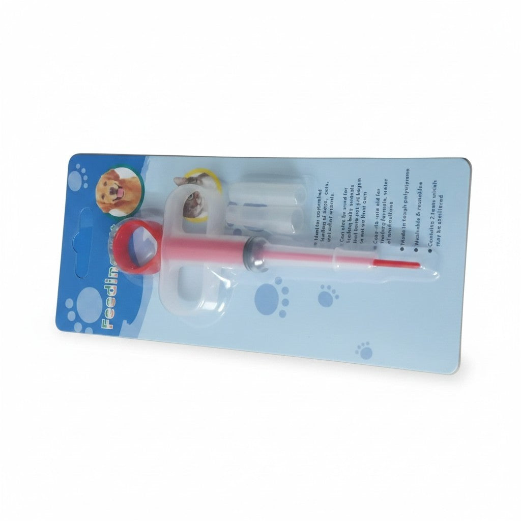 PetFriend pill gun for cats and dogs with a pink syringe and two soft silicone tips in original retail packaging