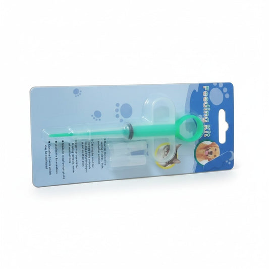 PetFriend pill gun for easy administration of tablets to cats and dogs, featuring a green plastic syringe tool.